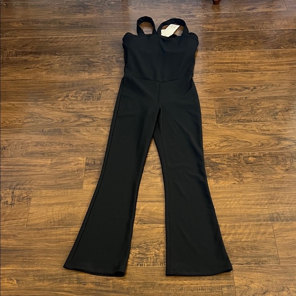 NWT Chic Black Sleeveless Jumpsuit - Picture 1 of 8